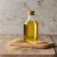 Bouteille d’huile de sésame entourée de graines